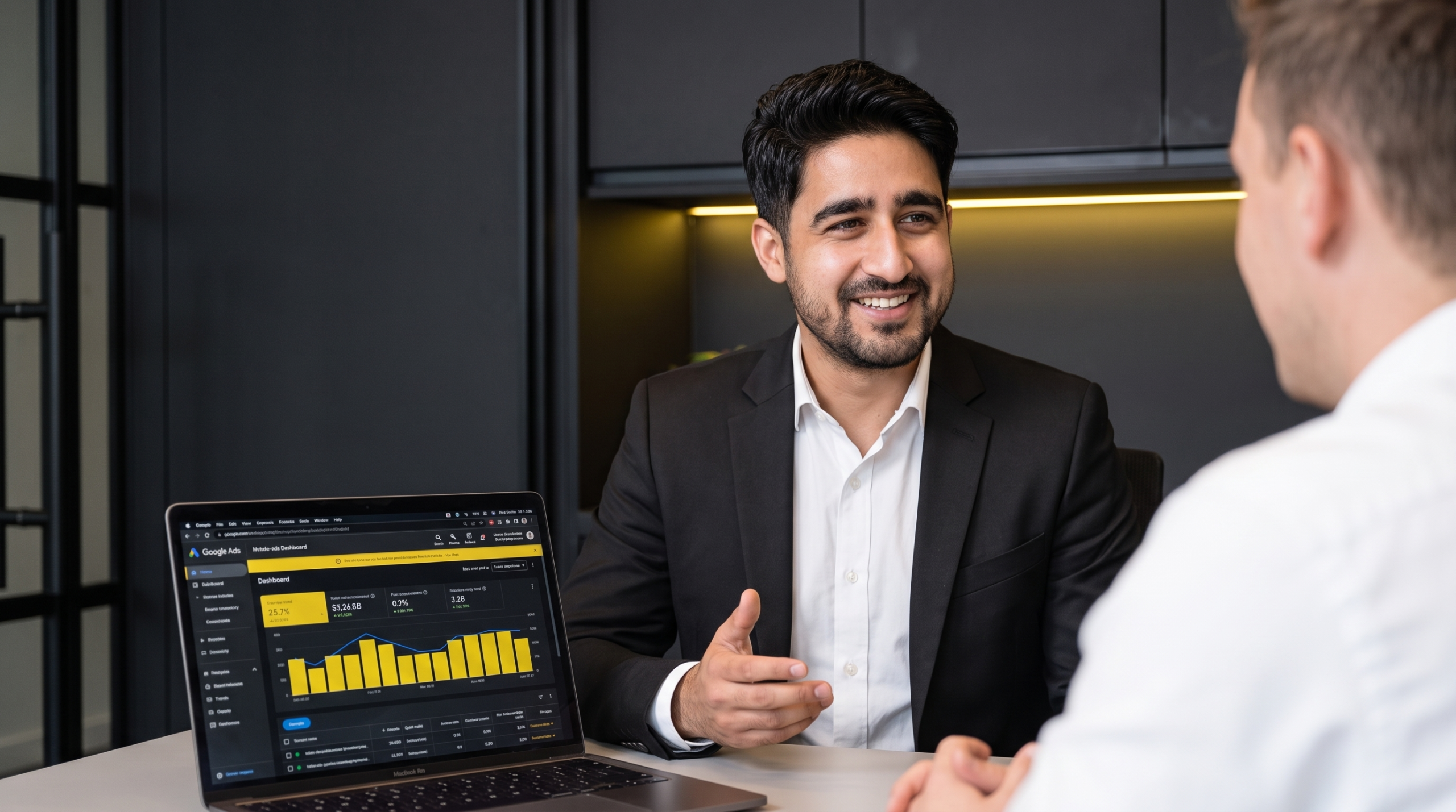 Aakash Pareek, digital marketing consultant in Dubai, reviewing a Google Ads account with a client